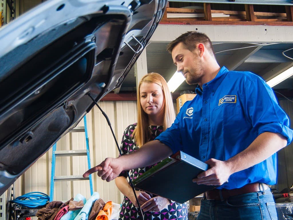Our qualified mechanics working on vehicle repairs in the workshop